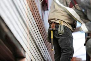 Builder with tools.